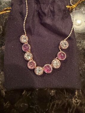 Necklace with white and pink crystal stones on gold chain